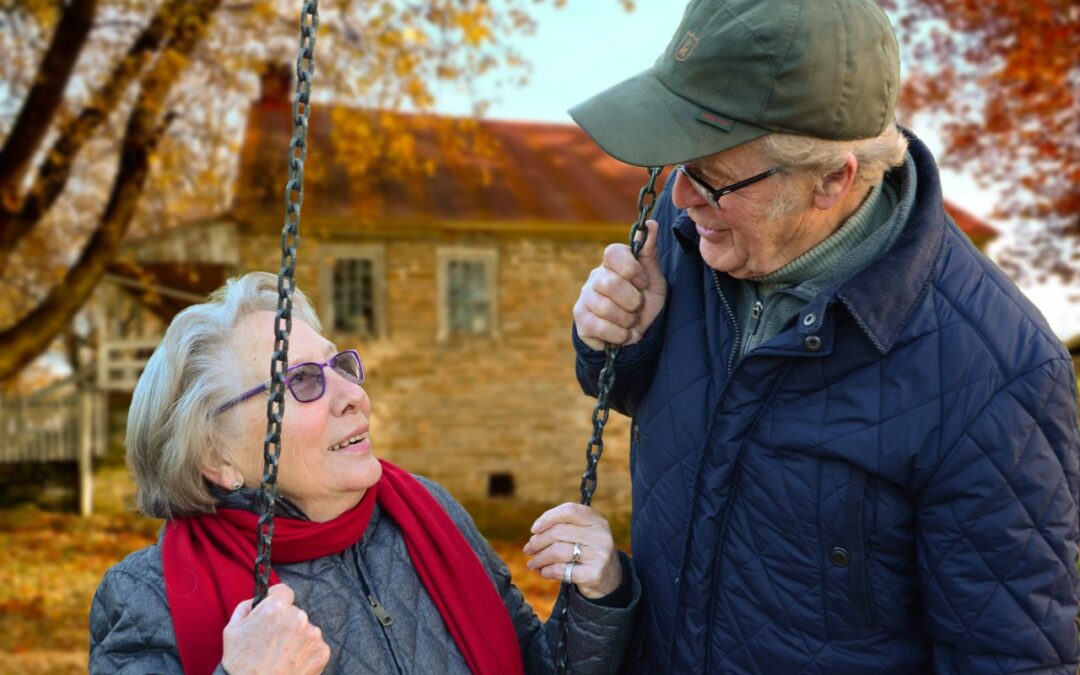 Older adults on a swing