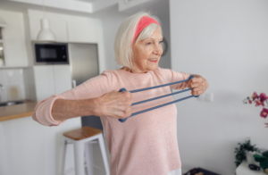 Older woman exercising with a resistance band