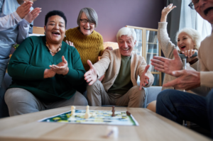 Older people playing a board game