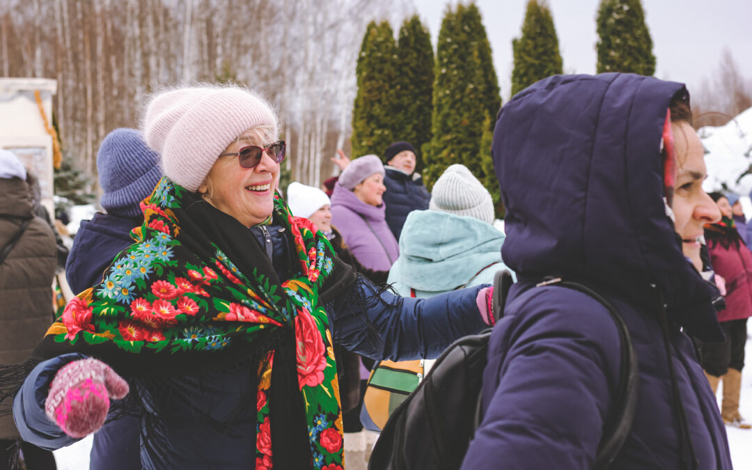 Community members gathering outside in winter